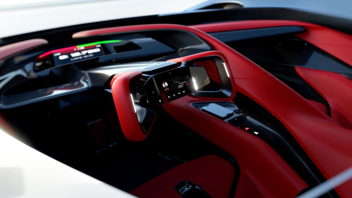 Corvette будущего: GM переосмысливает легендарный спорткар 2 Внутри редкость кнопки, большинство элементов управления расположены на сенсорном экране в ступице рулевого колеса.