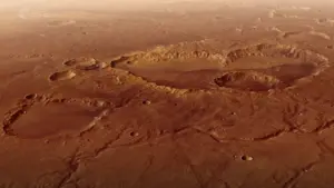 Mars Express показал огромный кратер на Марсе со следами древних водных потоков